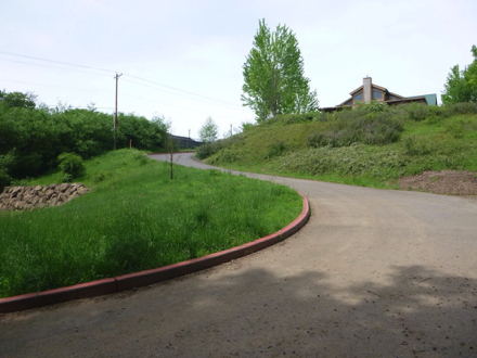 Road up from boat launch parking lot – steep grade – accessible parking and restrooms at the top
